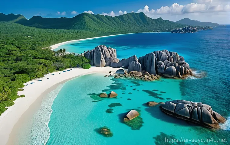 세이셸 관광 필수 스팟 - **Anse Source d'Argent: Emerald Waters and Granite Sentinels** "A tranquil, aerial view of Anse ...